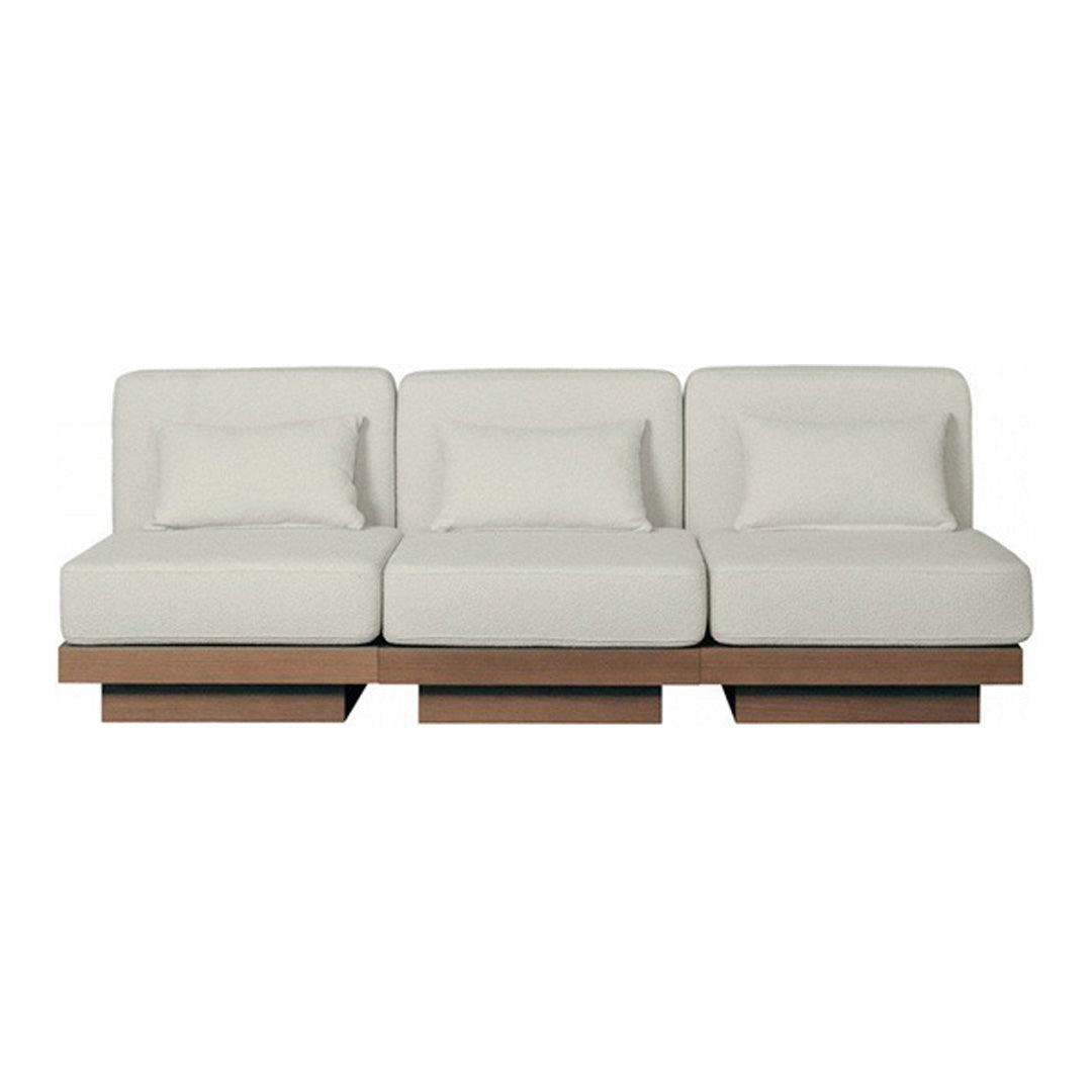 Modern white three-seat sofa with sleek, square cushions and a wooden base. Minimalist design with clean lines.