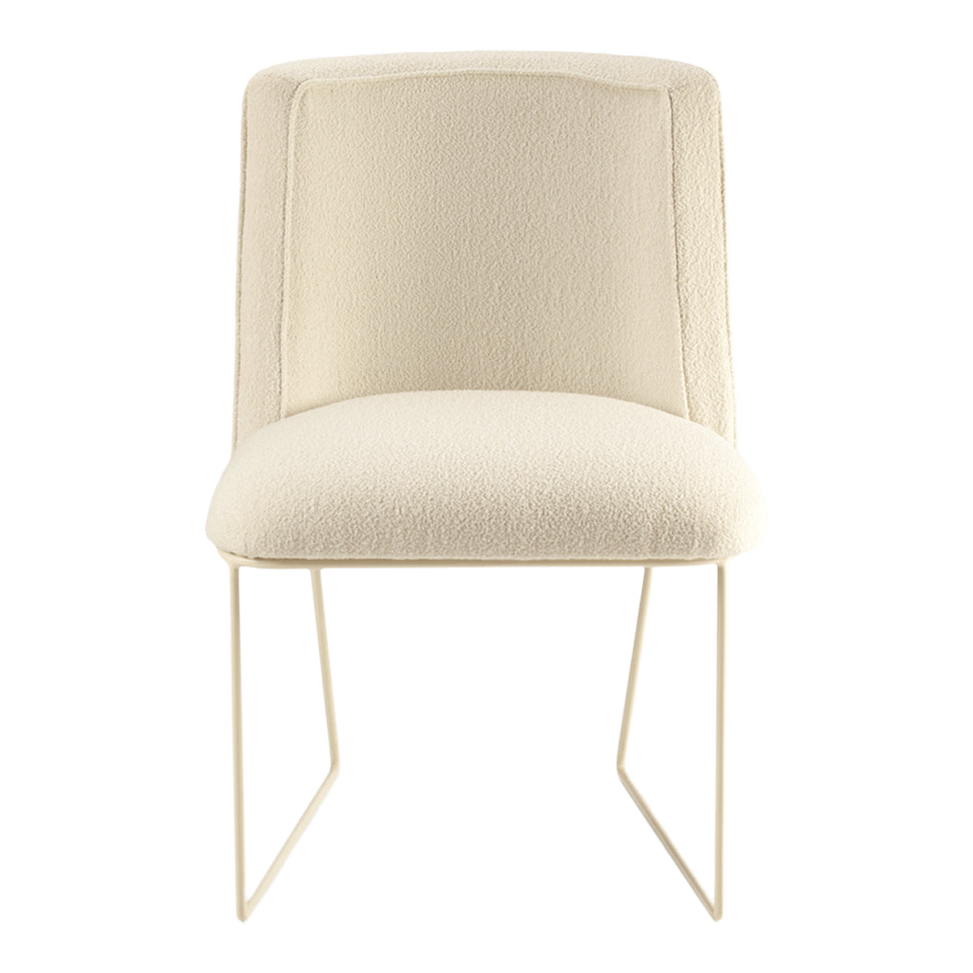 Cream upholstered chair with a textured surface and slim white metal legs, perfect for modern decor.