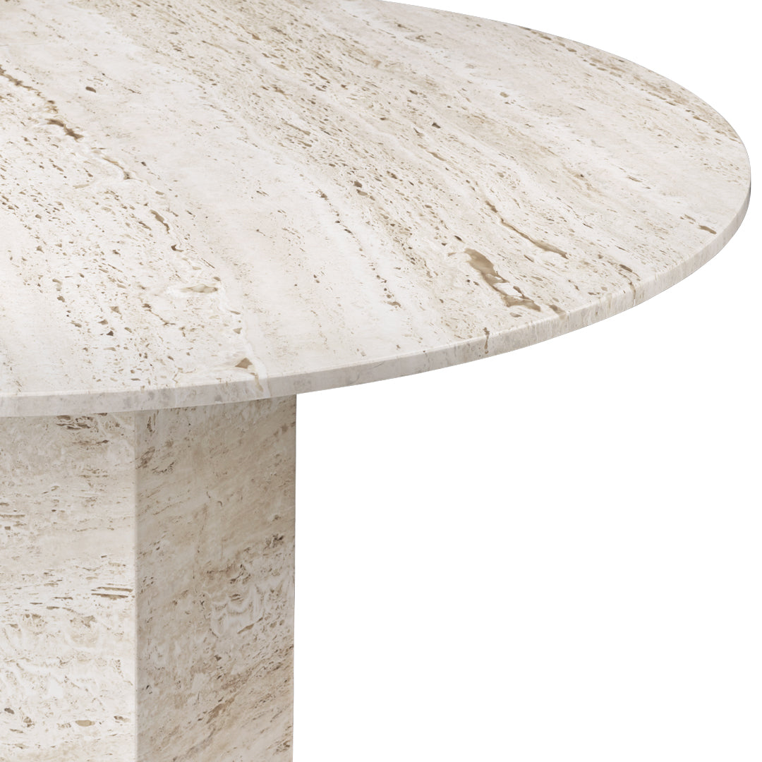 Cream-colored round marble table with subtle beige veining and polished finish, ideal for modern decor.