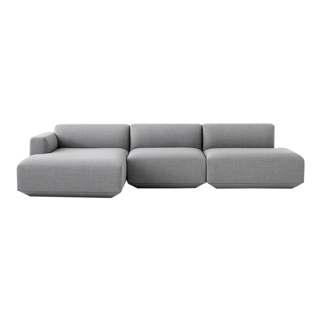 Minimalist gray sectional sofa with smooth, modern lines and a rectangular shape, perfect for contemporary decor.