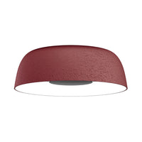 Rustic red ceiling light with a textured finish and sleek, minimal design, perfect for modern interiors.