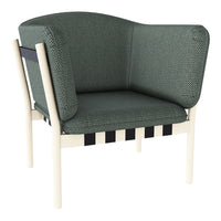 Stylish green patterned sofa chair with black and white striped base and a modern design.