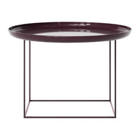 Burgundy round tray table with sleek metal base, featuring a minimalist design. Ideal for modern decor.