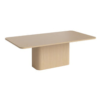 Light wood dining table with a smooth, rectangular surface and rounded edges, featuring a minimalist design.
