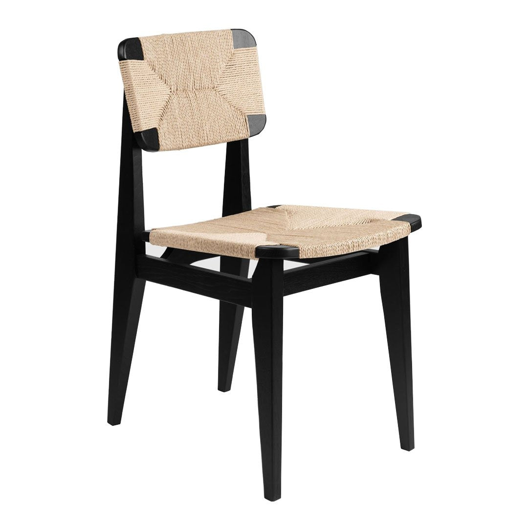 "Black wooden chair with a natural woven seat and back, featuring a simple, modern design and clean lines."