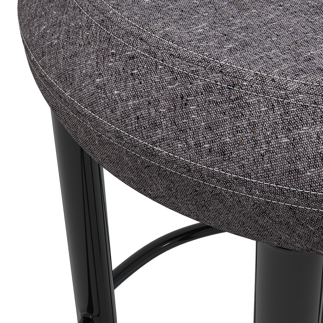 Gray textured fabric upholstery with subtle flecks, paired with sleek black metal legs.
