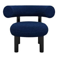 Navy blue chair with rounded back and seat, featuring a textured fabric and black legs. Modern, minimalist design.