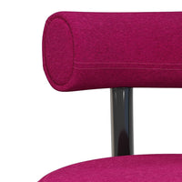 Vibrant fuchsia fabric with smooth, rounded edges and sleek, black metal legs. Ideal for modern decor.