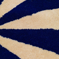 Navy blue and cream striped pattern with a plush texture, ideal for adding a stylish touch to any space.