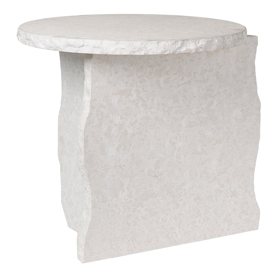 "Round white side table with a textured finish and unique, organic shape."