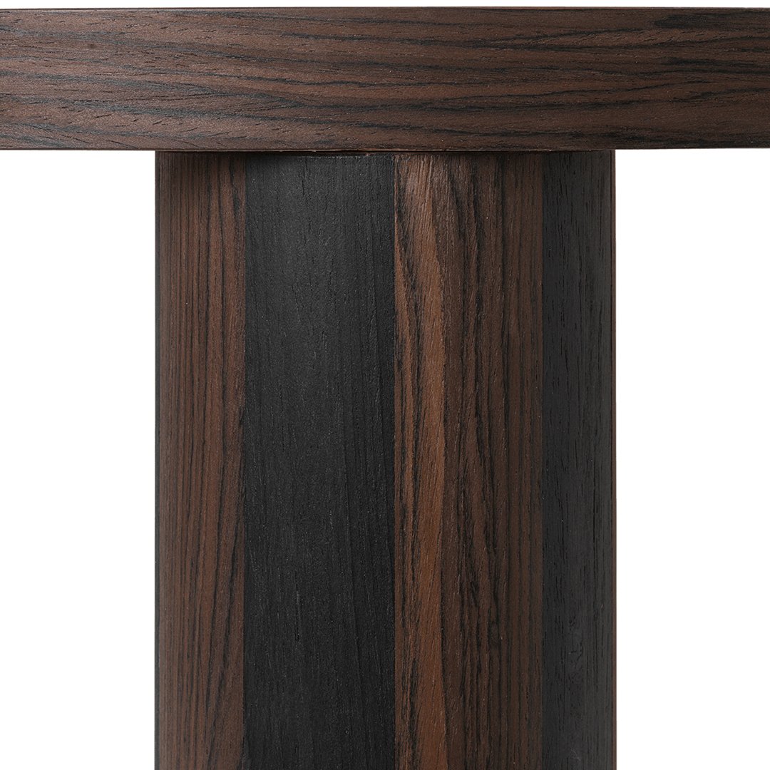 Dark wooden pillar with rich brown and black striped patterns, showcasing a sleek and modern design.