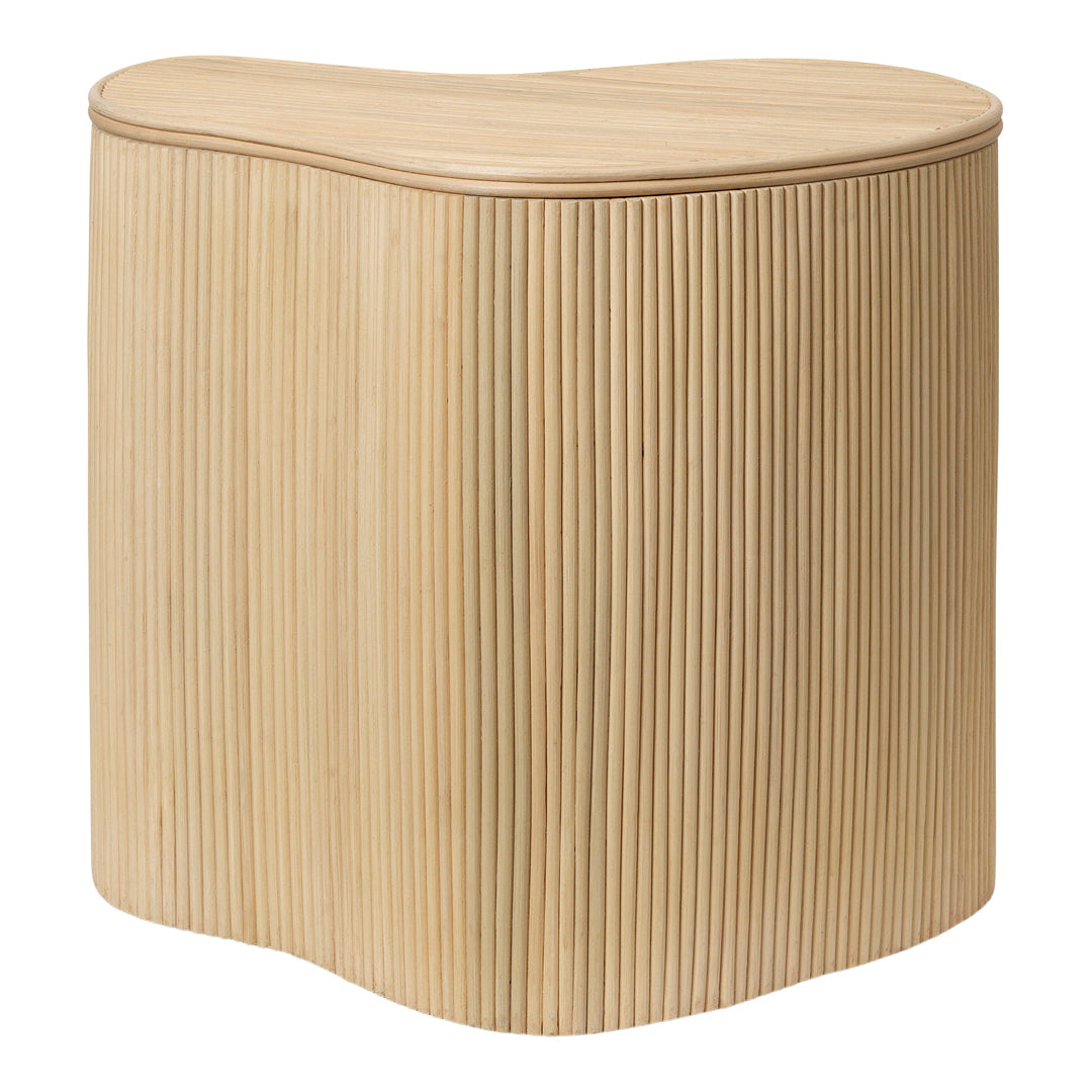 Natural wood color, textured vertical grooves, and a soft, curved shape create a modern accent piece.