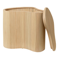Natural bamboo storage container with vertical ribbed pattern and smooth lid, highlighting earthy tones and textures.