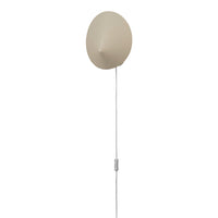 Beige oval wall lamp with a smooth finish, featuring a minimalist design and a clean white cord.