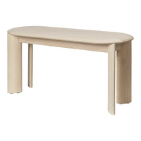Light wood oval table with a smooth, minimalist design and natural beige tones, featuring clean lines and rounded edges.