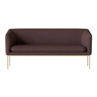 Brown upholstered sofa with sleek, smooth surfaces and gold metal legs, perfect for modern decor.