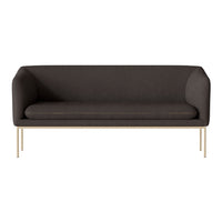 Dark gray sofa with a smooth fabric texture and minimalist design, featuring sleek gold metal legs.