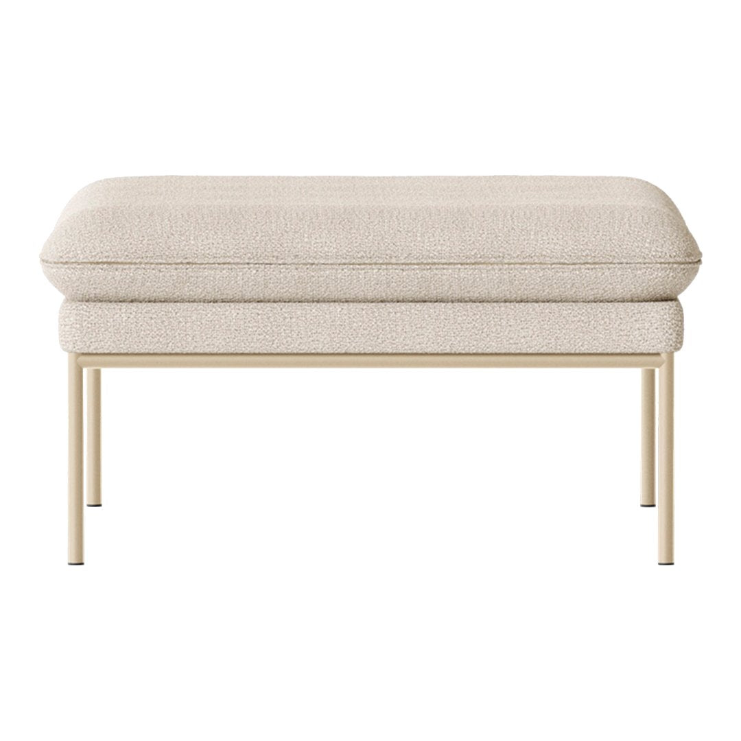 Beige upholstered ottoman with a textured pattern and sleek metal legs. Ideal for modern interiors.