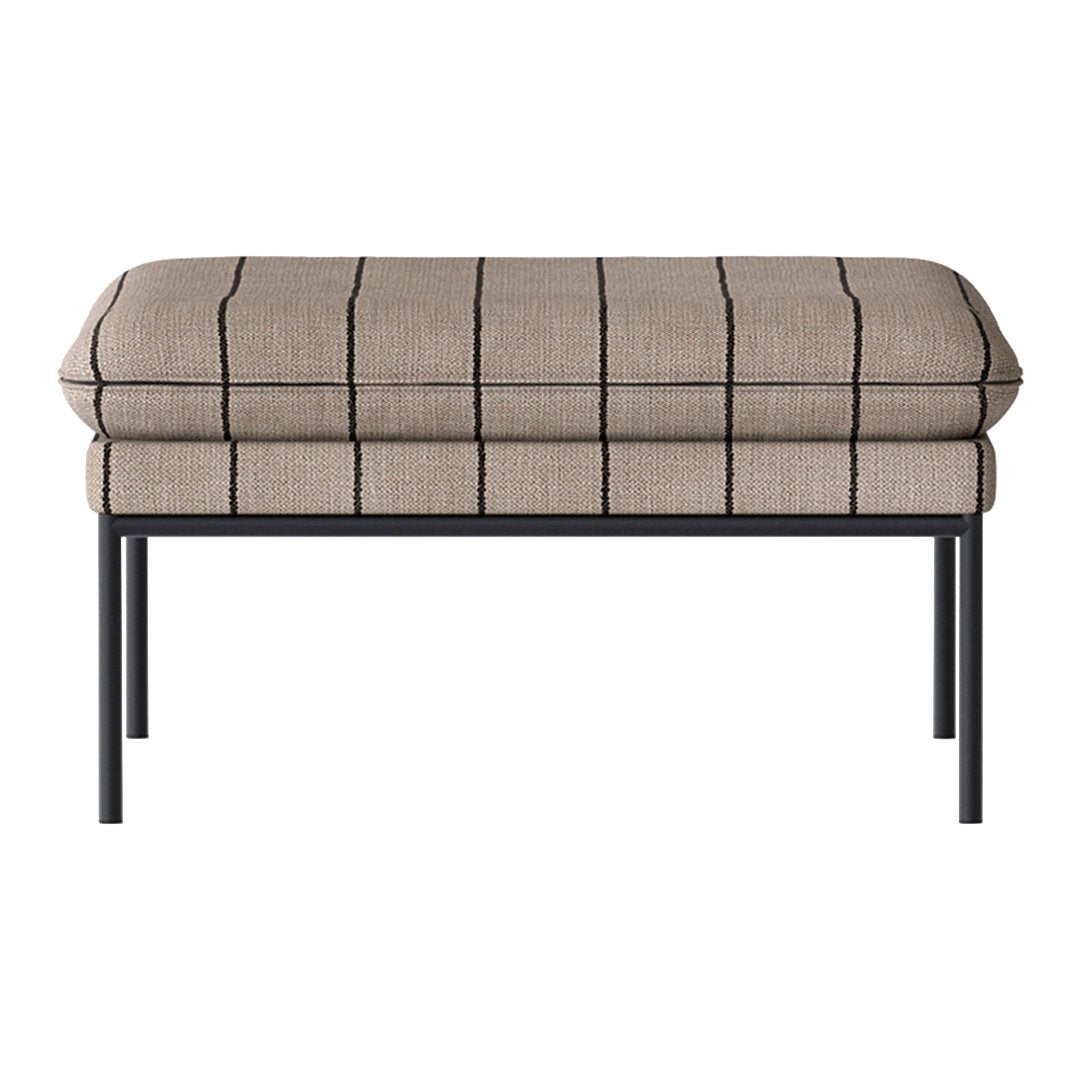 Beige upholstered ottoman with black grid pattern and sleek metal legs. Modern design for stylish interiors.