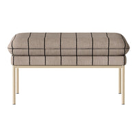 Beige upholstered ottoman with black grid pattern, featuring a sleek metal frame. Perfect for modern decor.