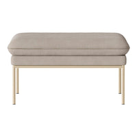 Light beige upholstered ottoman with a smooth texture and gold metal legs, offering modern simplicity and elegance.