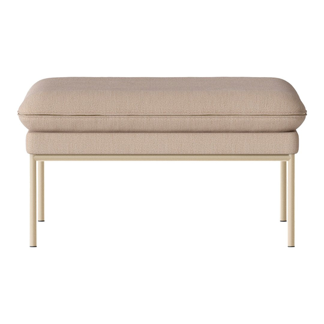 Beige upholstered ottoman with a smooth, textured surface and sleek gold metal legs. Perfect for modern decor.