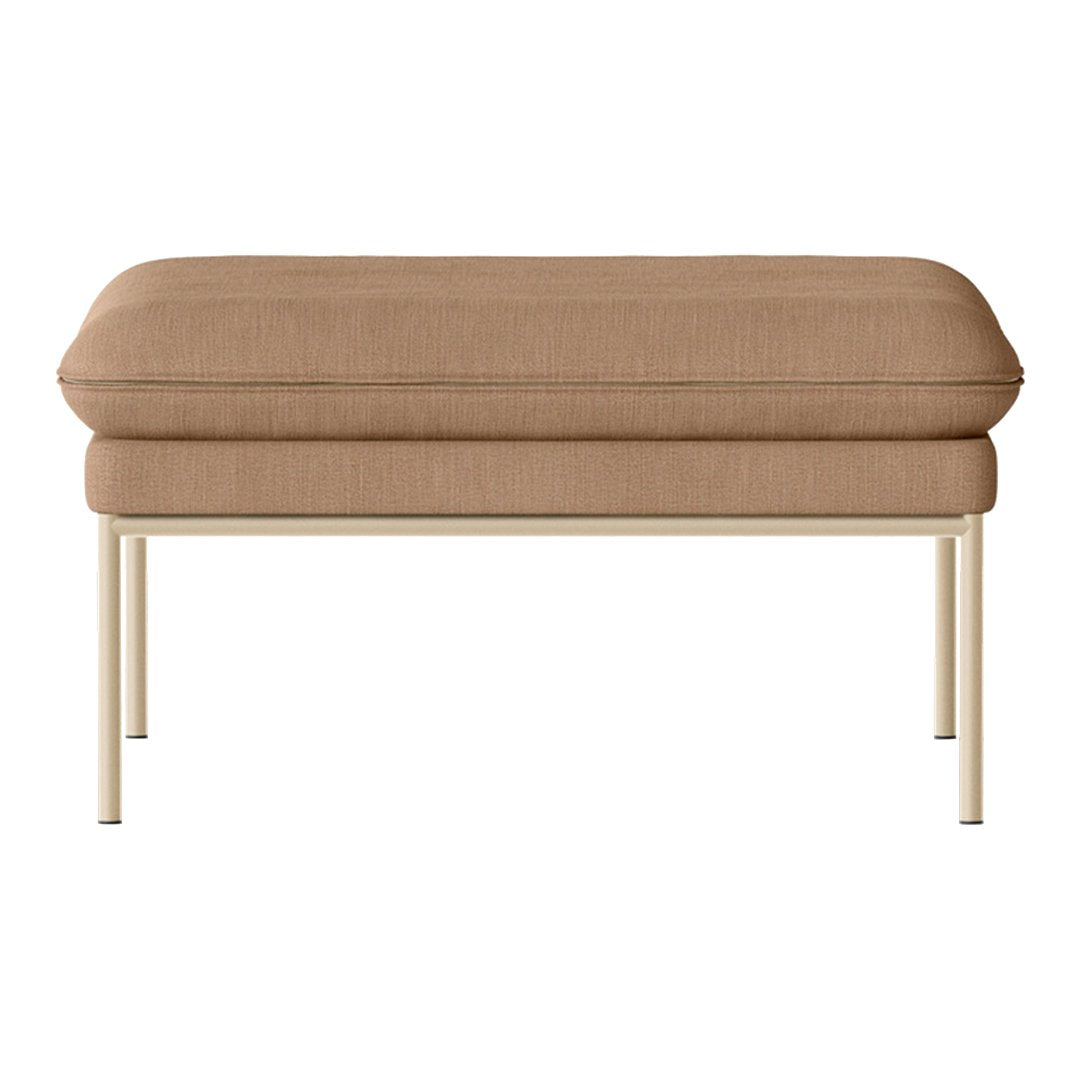 Brown upholstered ottoman with a smooth texture and cream-colored metal legs. Ideal for modern decor.