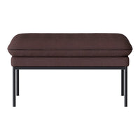 Brown upholstered ottoman with a smooth, solid surface and sleek black metal legs. Perfect for modern decor.