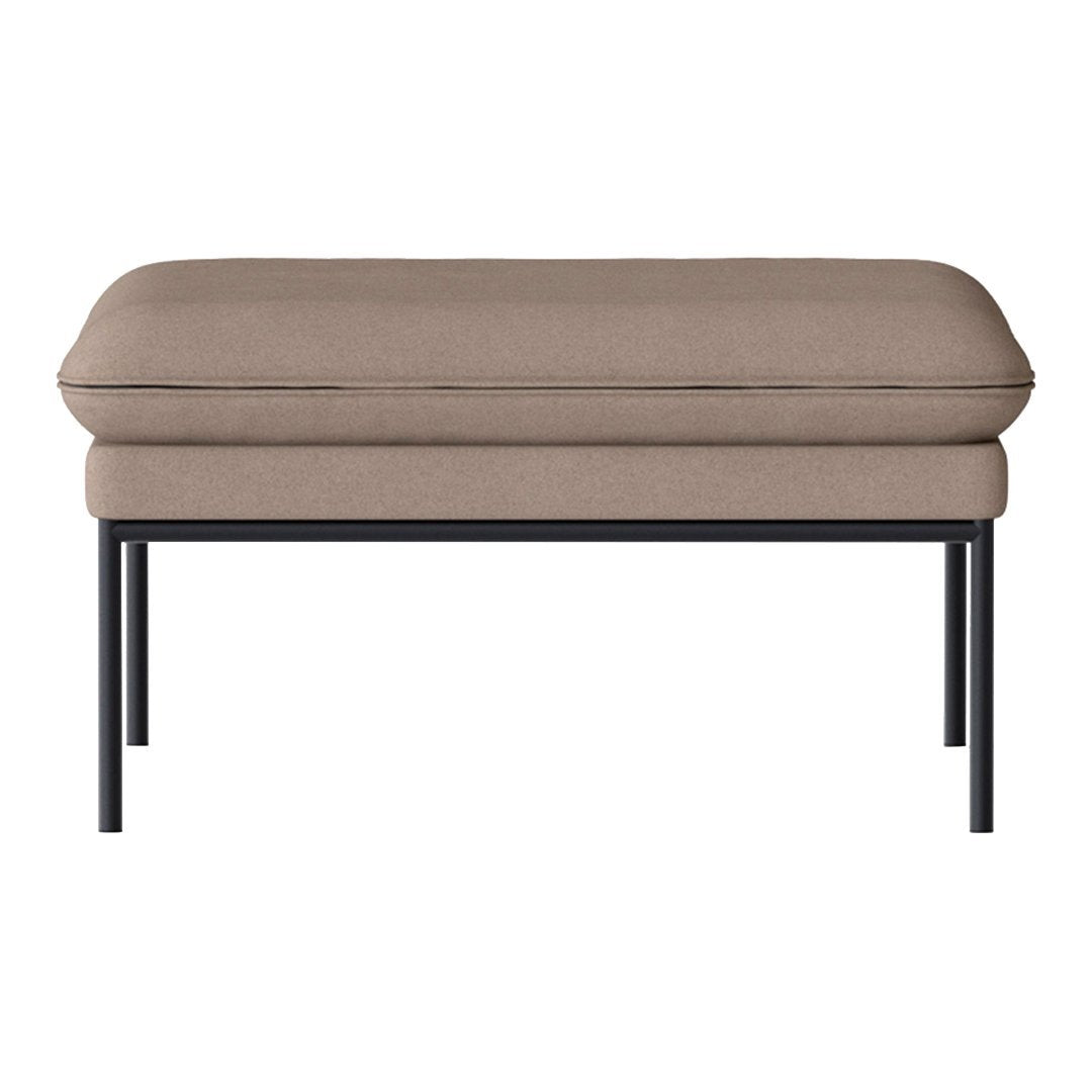 Beige cushioned bench with a sleek black metal frame, featuring a smooth, minimalist design. Perfect for modern decor.