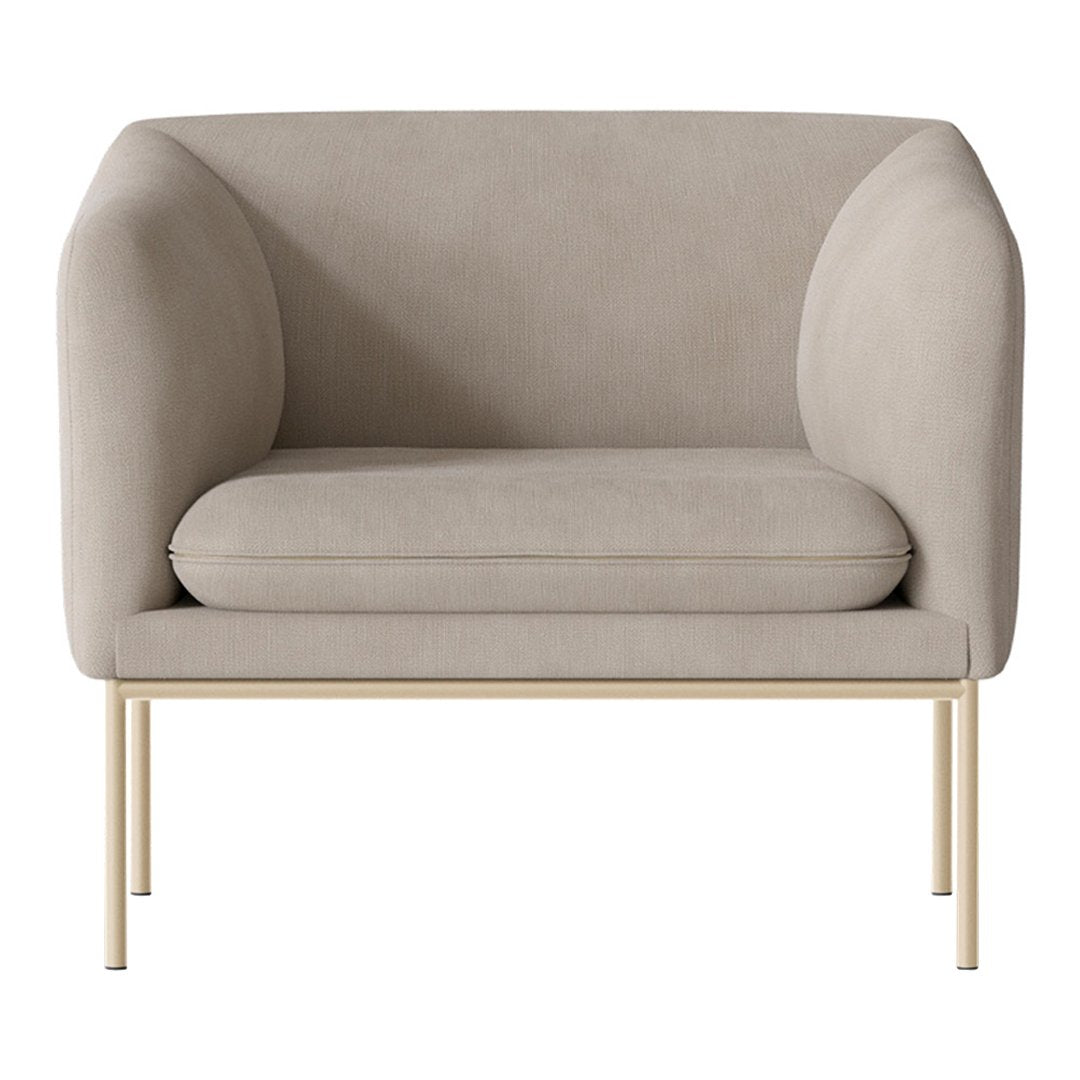 Beige upholstered armchair with smooth curves, featuring a minimalist gold metal frame. Neutral tones blend seamlessly.