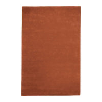 Rust-colored solid area rug with a smooth, soft texture, perfect for adding warmth to any space.