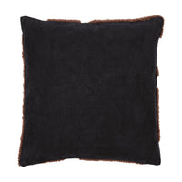 Black cushion with a soft texture and contrasting brown trim. Perfect for modern home decor.