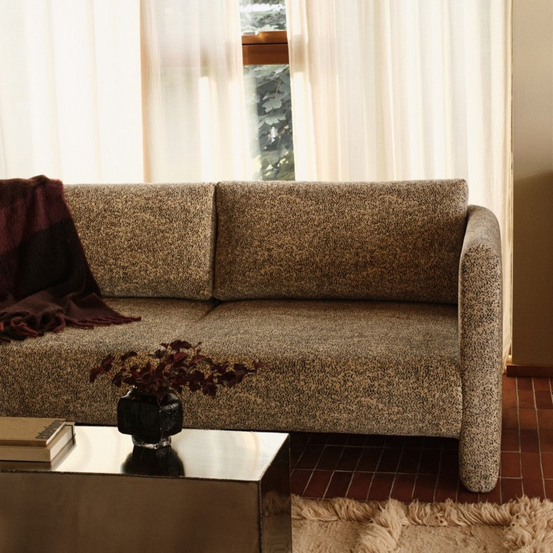 Patterned beige sofa with dark brown accents, featuring a textured fabric for a cozy, stylish look.