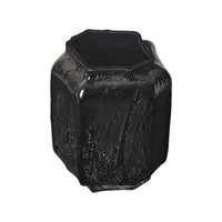 Octagonal black ceramic vase with a textured finish, featuring rich, glossy patterns. Perfect for modern decor.