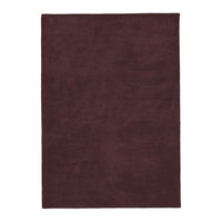 Burgundy solid area rug with a plush texture, perfect for adding warmth and elegance to any space.