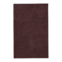 Solid burgundy area rug with a plush texture, perfect for adding warmth and elegance to any space.