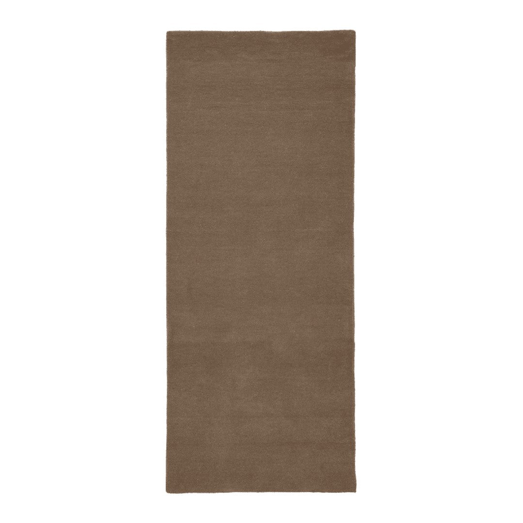 "Solid brown area rug with a smooth texture, perfect for subtle elegance in any room."