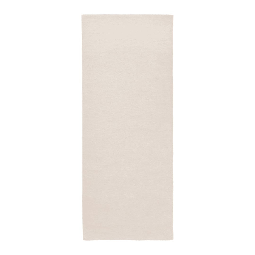 Plain beige rectangular rug with a smooth texture and minimalistic design, perfect for versatile decor styles.