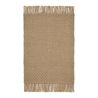 Textured beige rug with fringed edges, featuring a woven pattern for a natural look. Perfect for various decor styles.