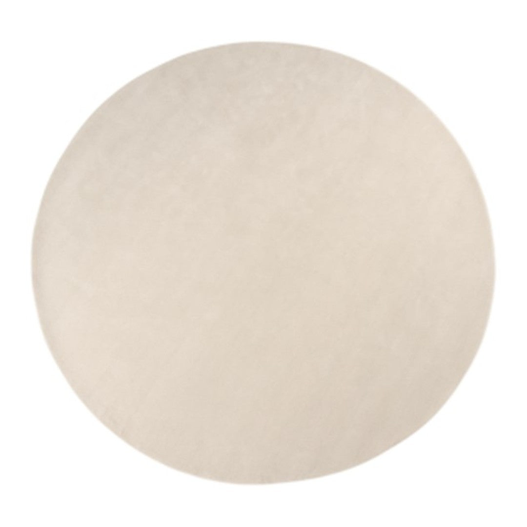 Light beige circular rug with a smooth, flat surface, perfect for minimalist interior decor.