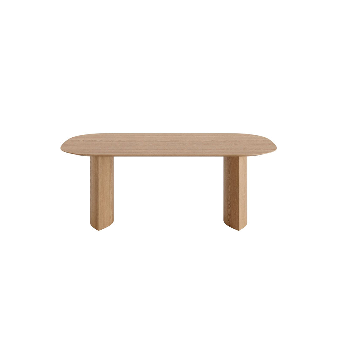 Natural wood dining table with smooth, rounded edges and a minimalist design. Ideal for modern decor.
