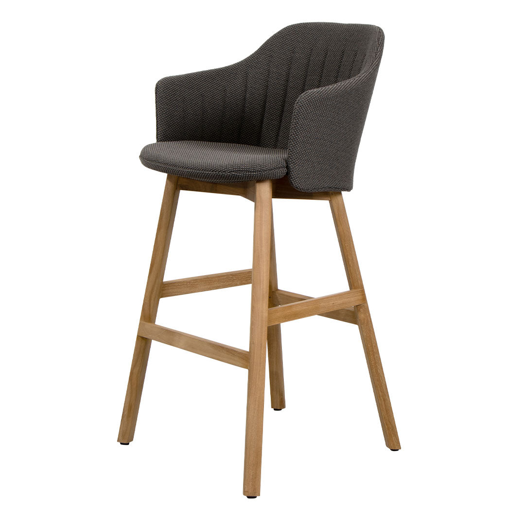 Gray upholstered high chair with ribbed pattern and natural wood legs, perfect for modern dining spaces.