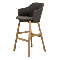 Gray upholstered high chair with ribbed pattern and natural wood legs, perfect for modern dining spaces.
