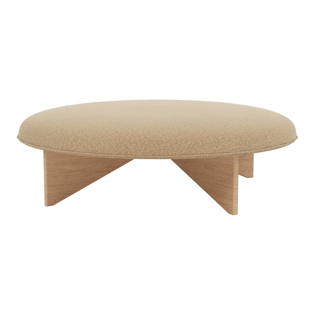 Round beige upholstered ottoman with a smooth texture and natural wood legs, featuring a minimalistic design.