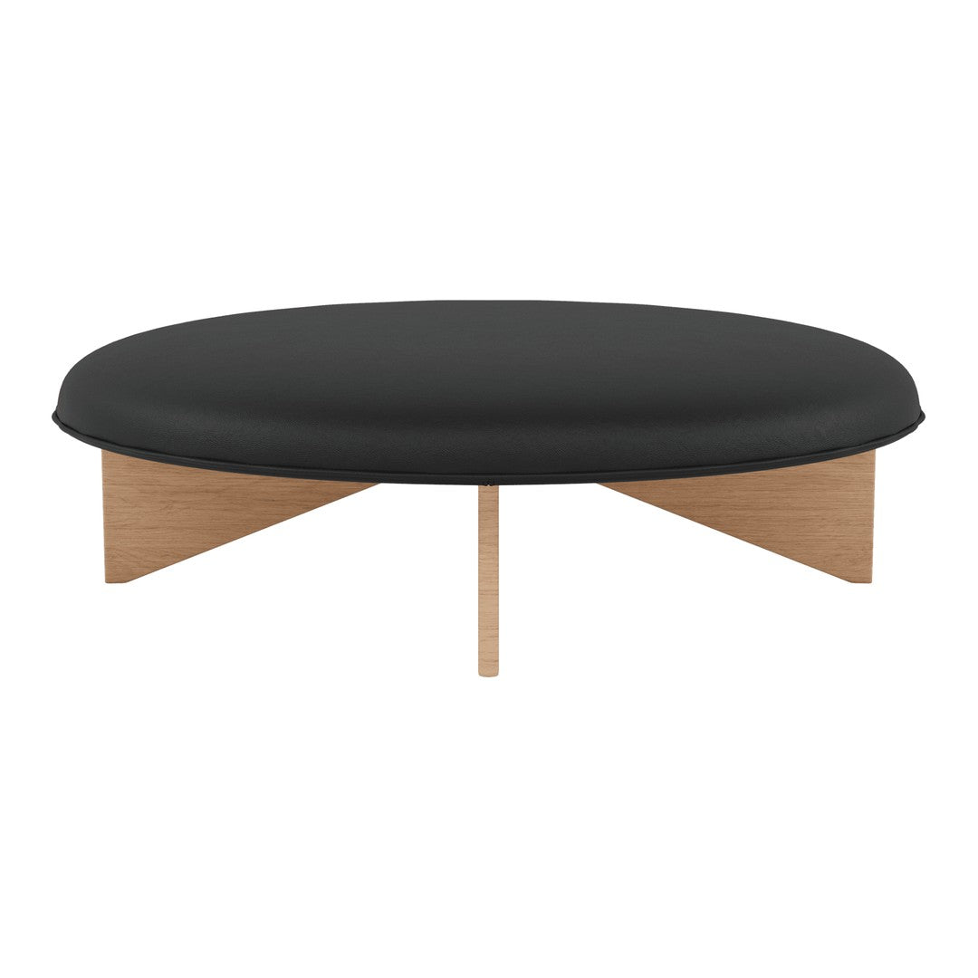 Black round coffee table with natural wood legs, featuring a sleek, minimalist design and smooth surface.