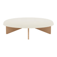 Round coffee table in soft white with natural wood legs and a minimalist design, enhancing contemporary interiors.
