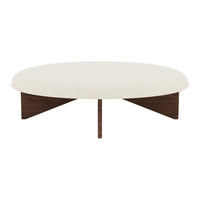 Round coffee table with a smooth cream top and rich dark wood base, featuring a sleek and modern design.