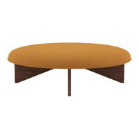 Round coffee table with a warm mustard yellow fabric top and a sleek wooden base. Modern and stylish design.