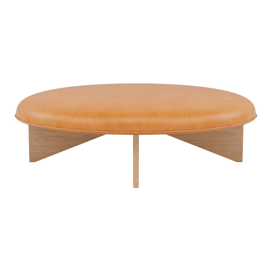Round leather ottoman in warm caramel color with a natural wood base. Simple, modern design with no visible patterns.