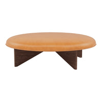 Round coffee table with a smooth tan top and modern dark wood legs, featuring sleek, minimalist design.